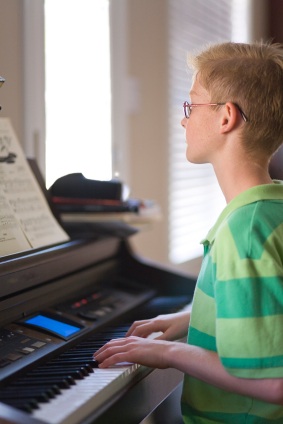 autistic boy piano